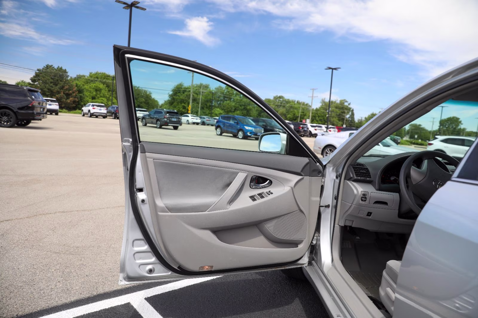2010 Classic Silver Metallic Toyota Camry LE FWD Sedan