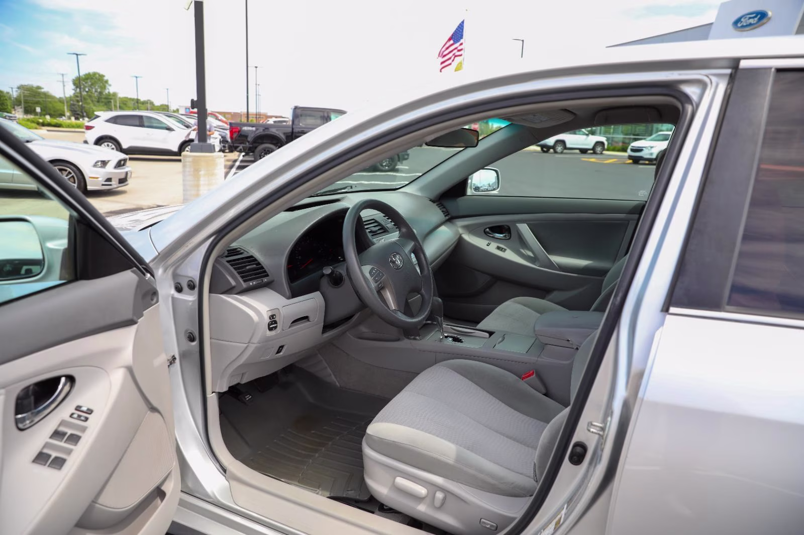 2010 Classic Silver Metallic Toyota Camry LE FWD Sedan