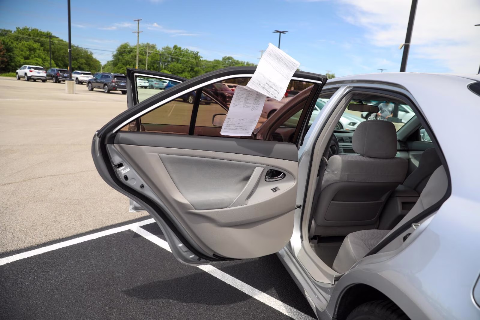 2010 Classic Silver Metallic Toyota Camry LE FWD Sedan