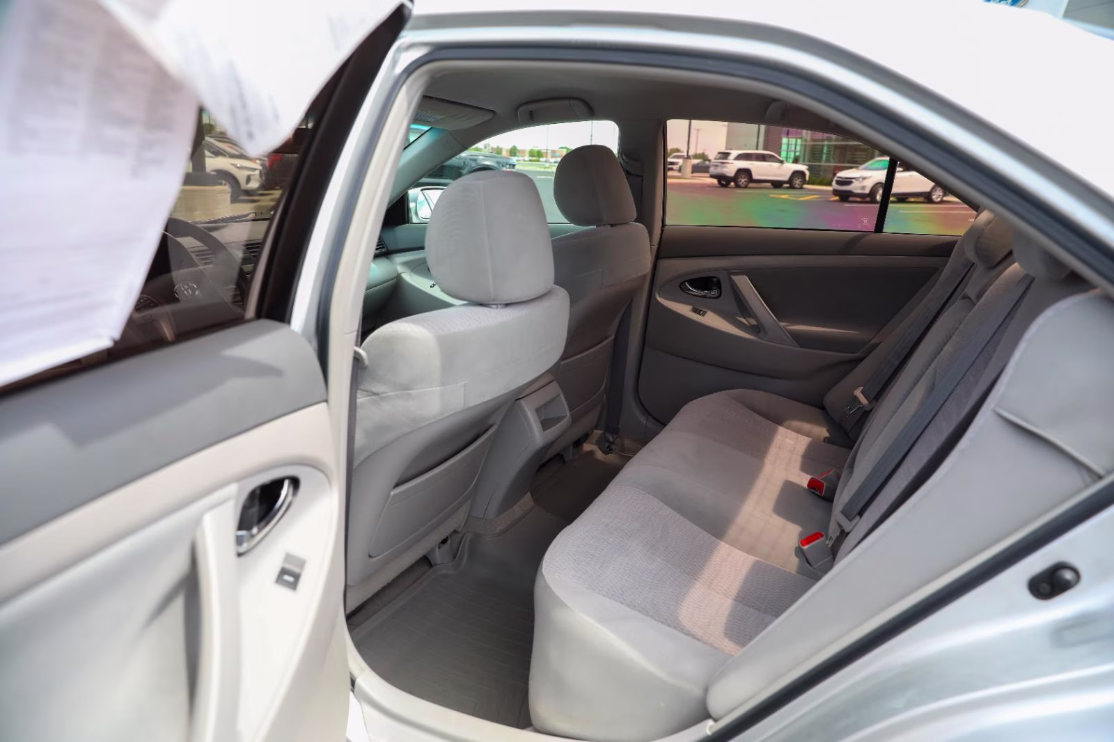 2010 Classic Silver Metallic Toyota Camry LE FWD Sedan