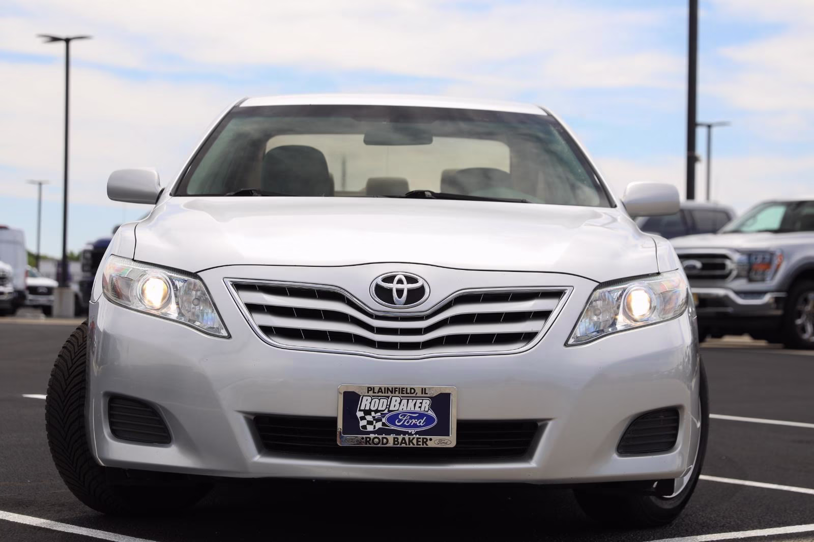 2010 Classic Silver Metallic Toyota Camry LE FWD Sedan
