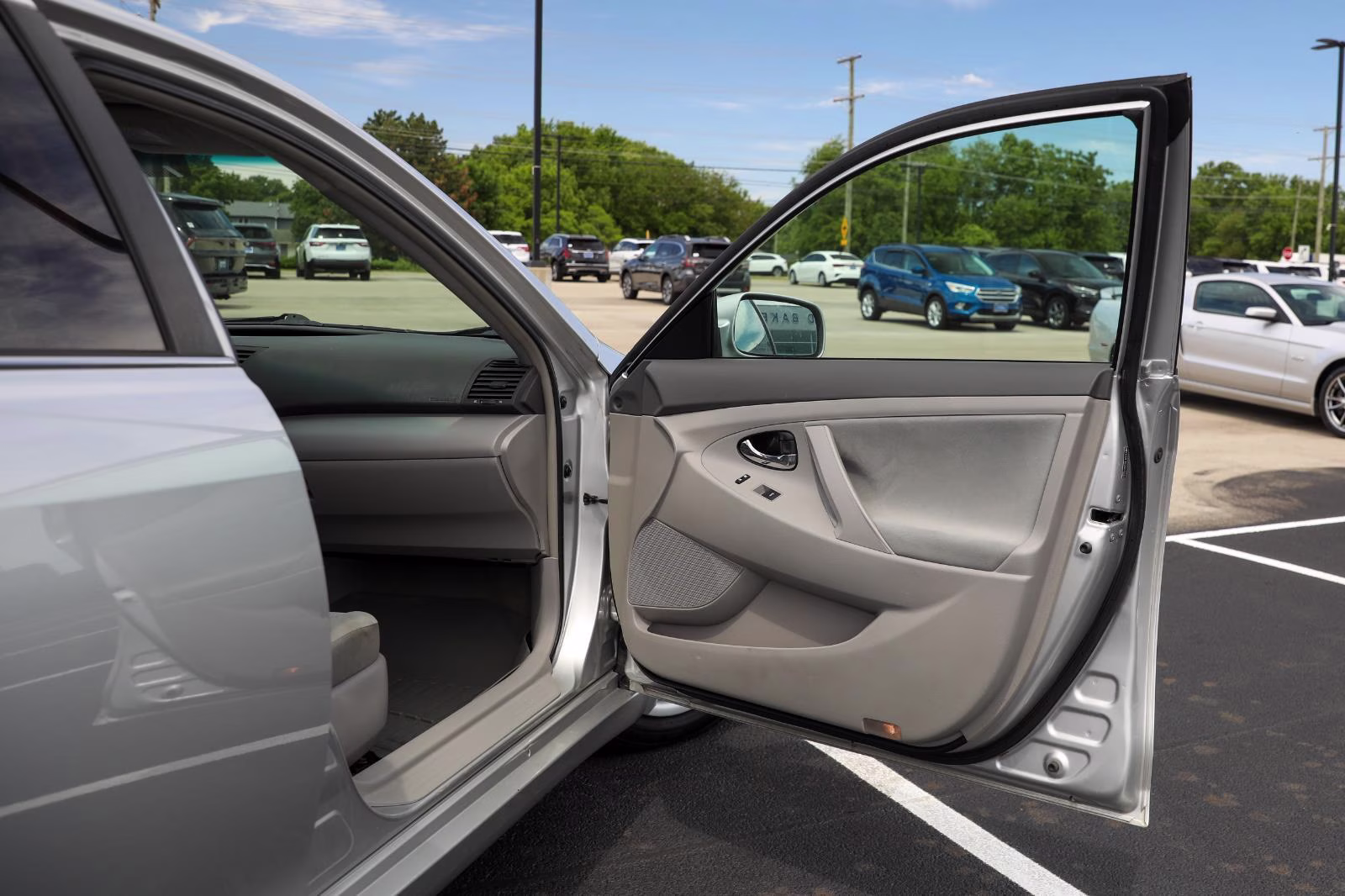 2010 Classic Silver Metallic Toyota Camry LE FWD Sedan