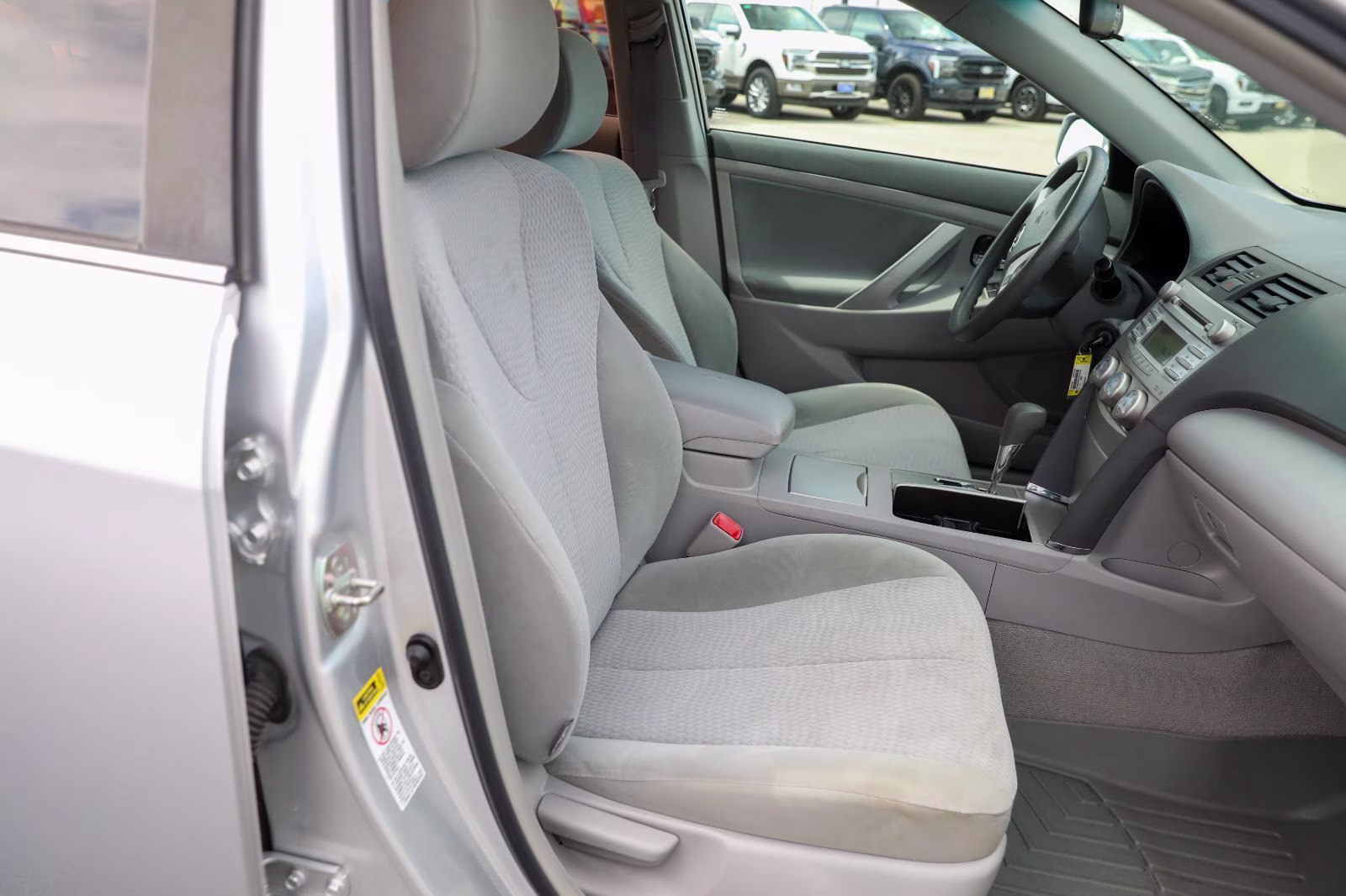 2010 Classic Silver Metallic Toyota Camry LE FWD Sedan