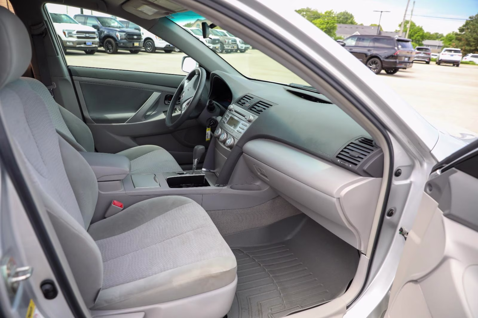 2010 Classic Silver Metallic Toyota Camry LE FWD Sedan