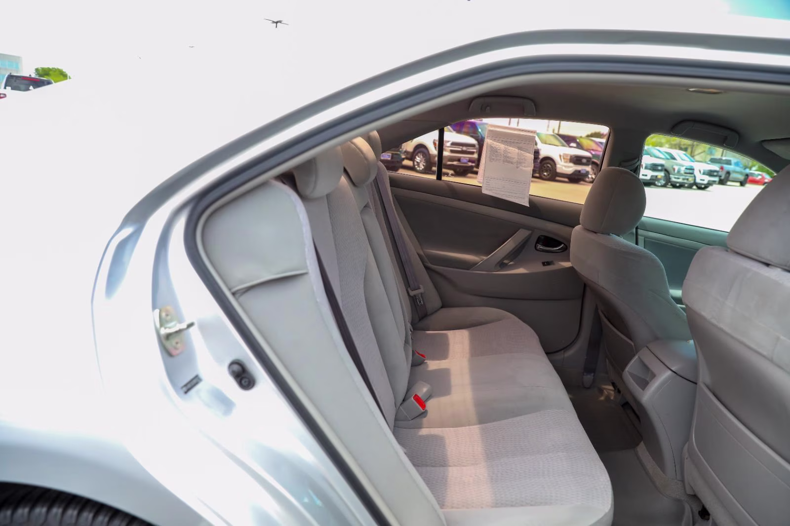 2010 Classic Silver Metallic Toyota Camry LE FWD Sedan