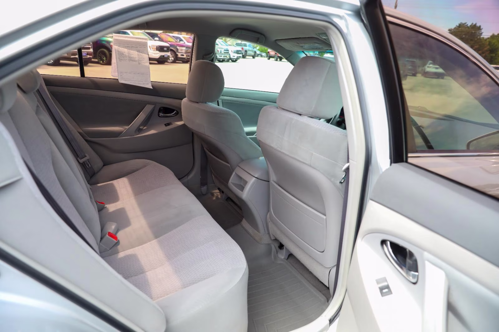 2010 Classic Silver Metallic Toyota Camry LE FWD Sedan