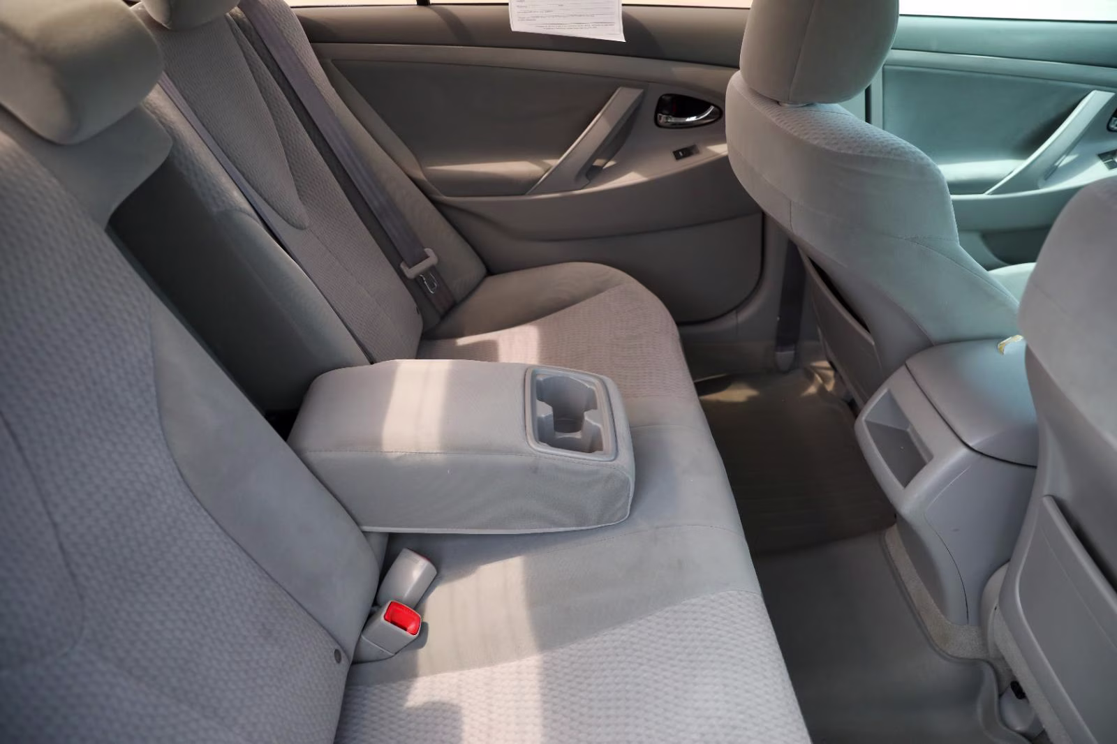 2010 Classic Silver Metallic Toyota Camry LE FWD Sedan