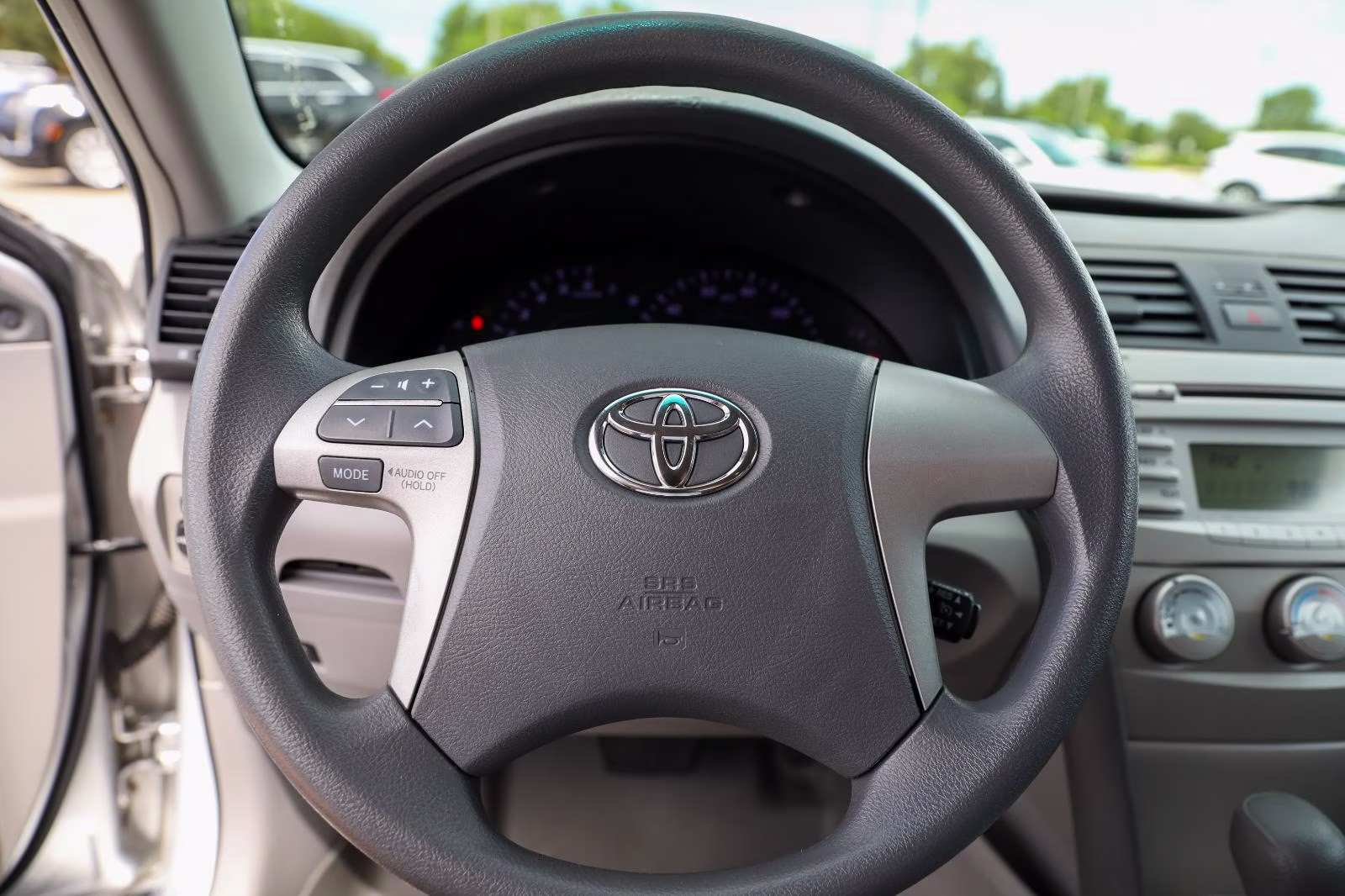 2010 Classic Silver Metallic Toyota Camry LE FWD Sedan