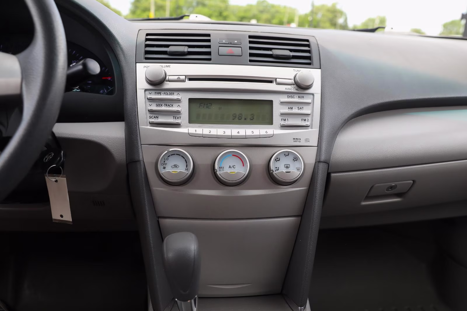 2010 Classic Silver Metallic Toyota Camry LE FWD Sedan