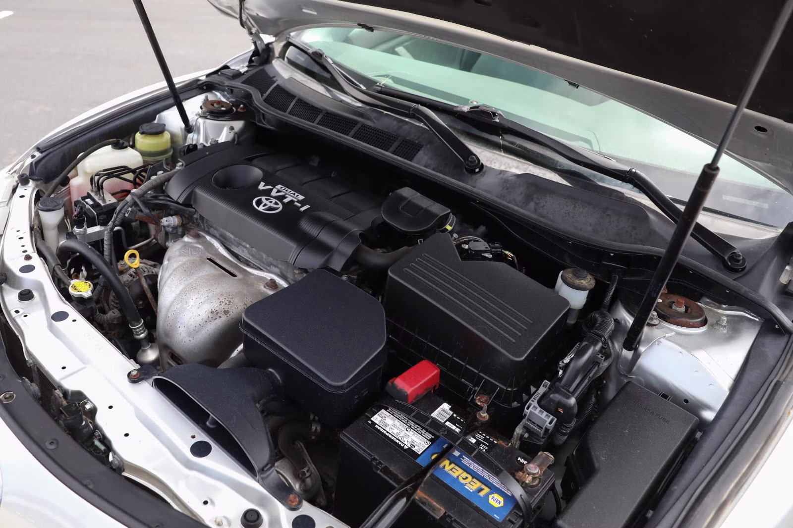 2010 Classic Silver Metallic Toyota Camry LE FWD Sedan