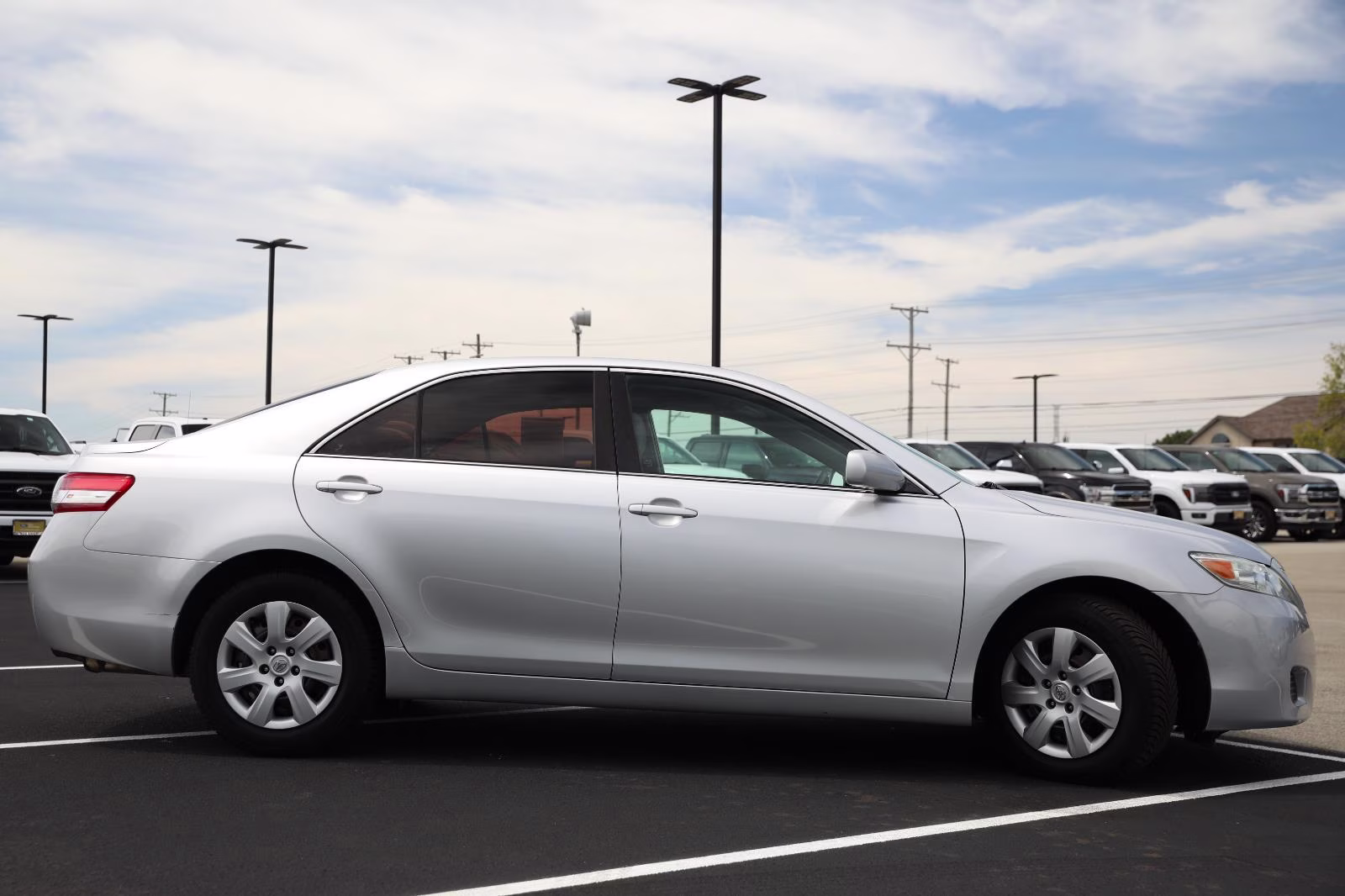 2010 Classic Silver Metallic Toyota Camry LE FWD Sedan