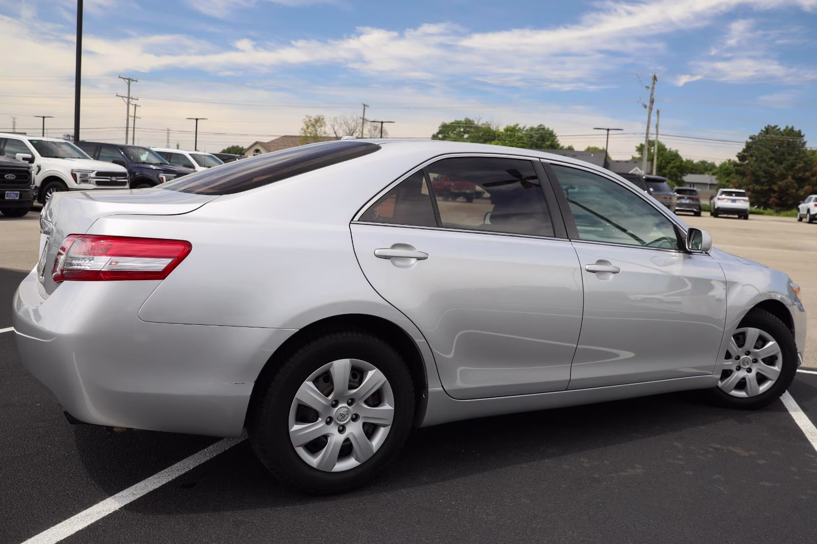 2010 Classic Silver Metallic Toyota Camry LE FWD Sedan