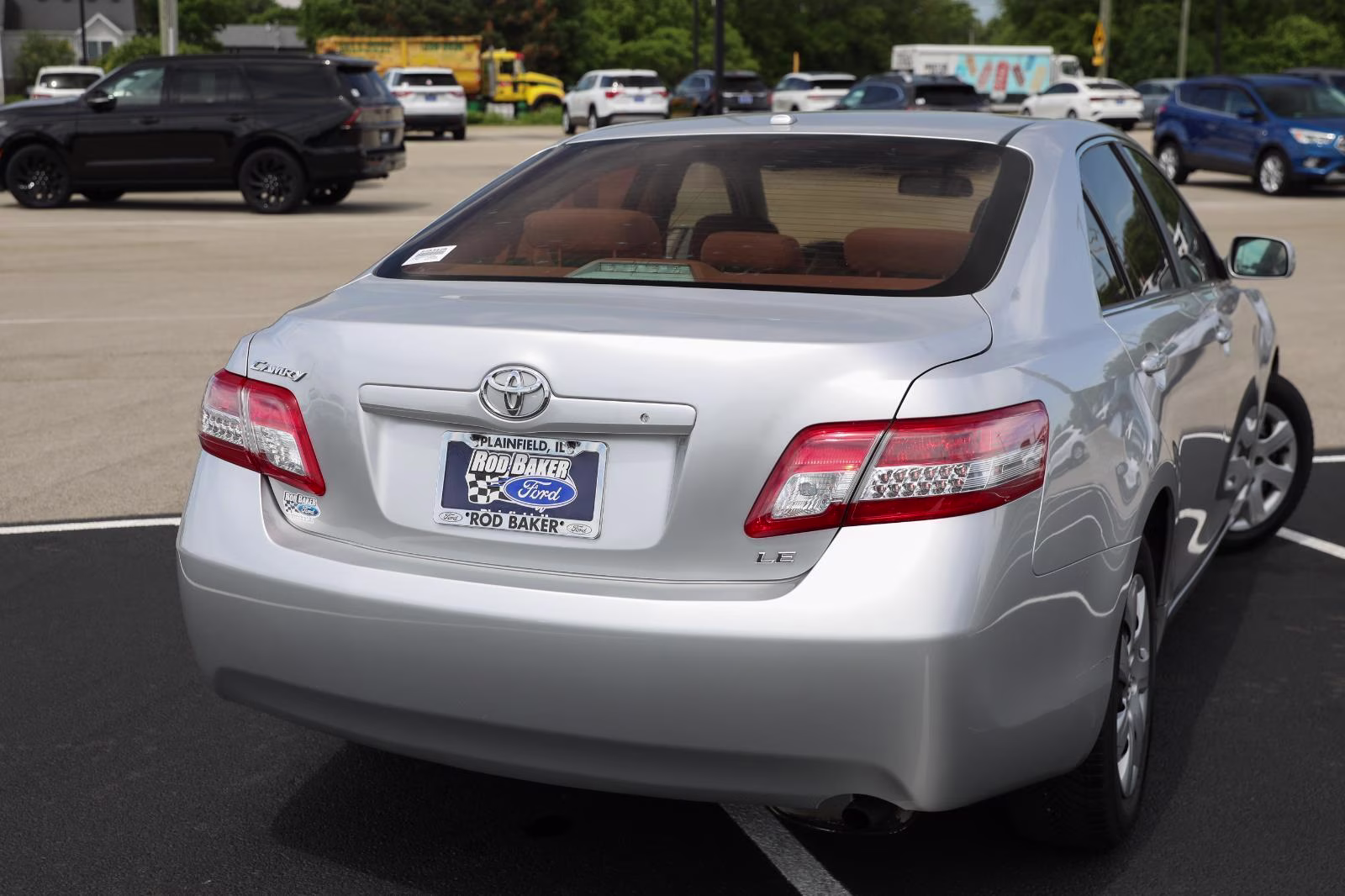 2010 Classic Silver Metallic Toyota Camry LE FWD Sedan