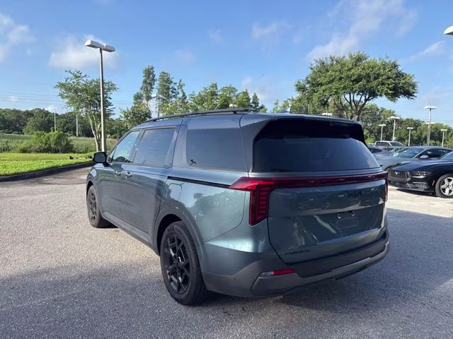 2025 Astra Blue Kia Carnival Hybrid SX Prestige FWD Van