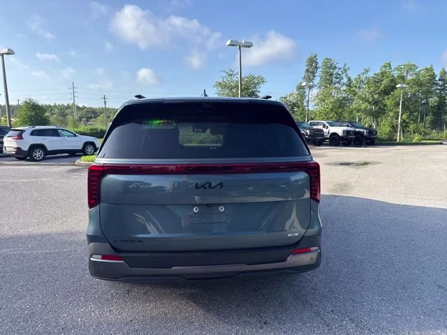 2025 Astra Blue Kia Carnival Hybrid SX Prestige FWD Van