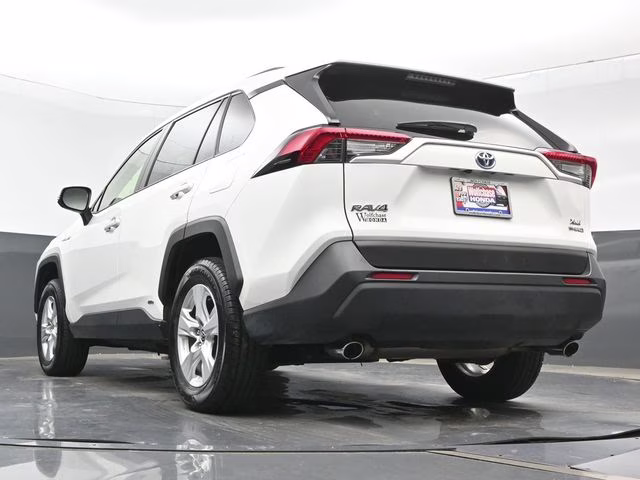 2021 Blizzard Pearl/Midnight Black Metallic Toyota RAV4 Hybrid XLE AWD SUV