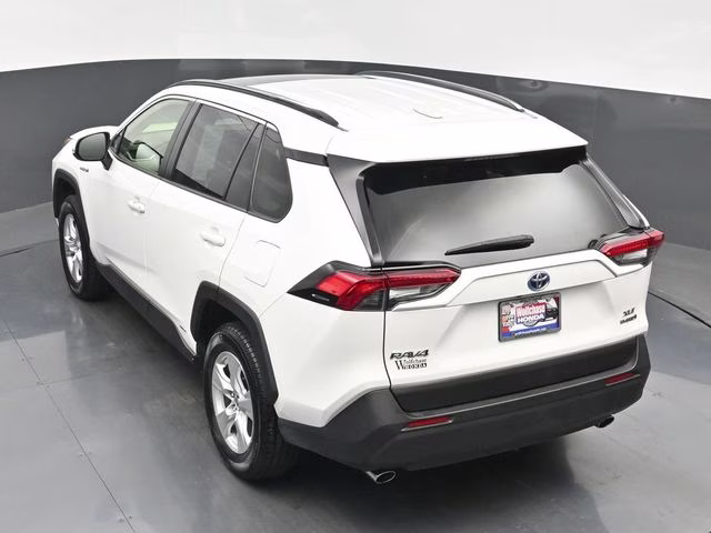 2021 Blizzard Pearl/Midnight Black Metallic Toyota RAV4 Hybrid XLE AWD SUV