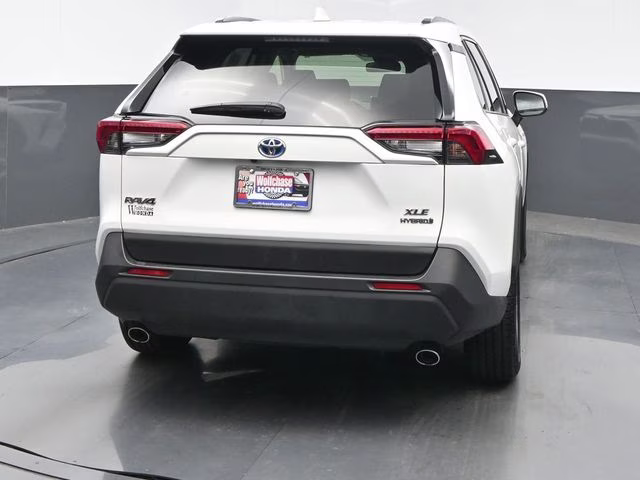 2021 Blizzard Pearl/Midnight Black Metallic Toyota RAV4 Hybrid XLE AWD SUV