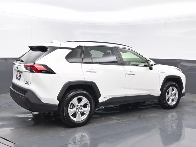 2021 Blizzard Pearl/Midnight Black Metallic Toyota RAV4 Hybrid XLE AWD SUV