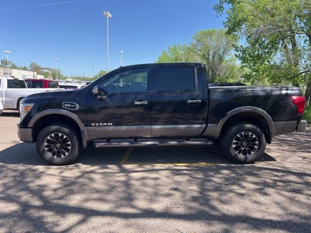 2017 Magnetic Black Nissan Titan Platinum Reserve 4X4 Truck