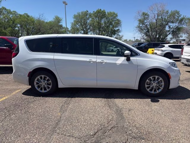 2023 Bright White Clearcoat Chrysler Pacifica Touring L AWD Van