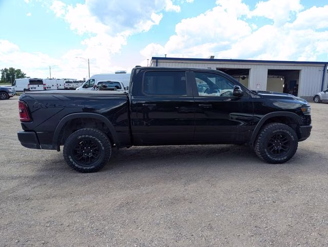 2025 Diamond Black Crystal Pearlcoat Ram 1500 Rebel 4X4 Truck