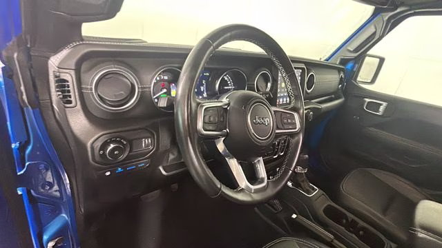 2023 Hydro Blue Pearl Coat Jeep Wrangler Sahara 4xe 4X4 SUV