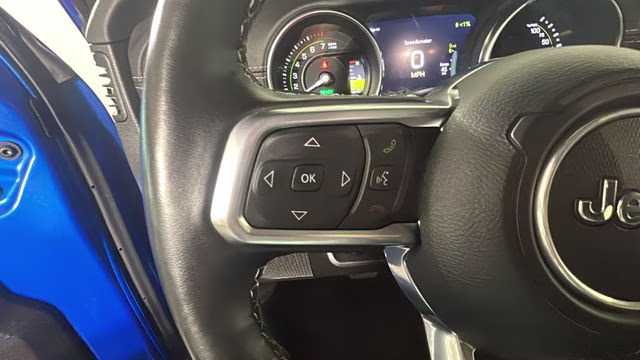 2023 Hydro Blue Pearl Coat Jeep Wrangler Sahara 4xe 4X4 SUV