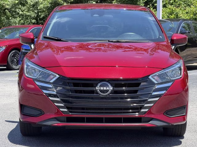 2024 Scarlet Ember Tintcoat Nissan Versa 1.6 SV FWD Sedan