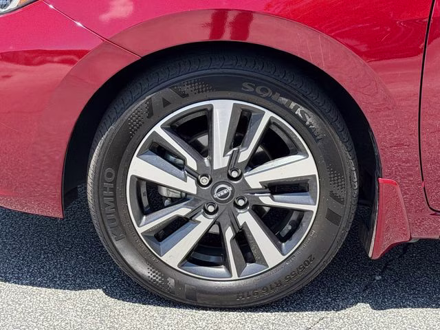 2024 Scarlet Ember Tintcoat Nissan Versa 1.6 SV FWD Sedan