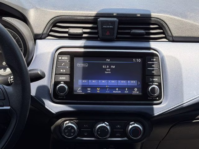 2024 Scarlet Ember Tintcoat Nissan Versa 1.6 SV FWD Sedan