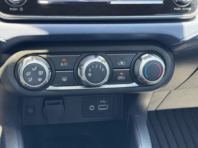 2024 Scarlet Ember Tintcoat Nissan Versa 1.6 SV FWD Sedan