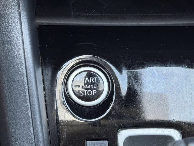 2024 Scarlet Ember Tintcoat Nissan Versa 1.6 SV FWD Sedan