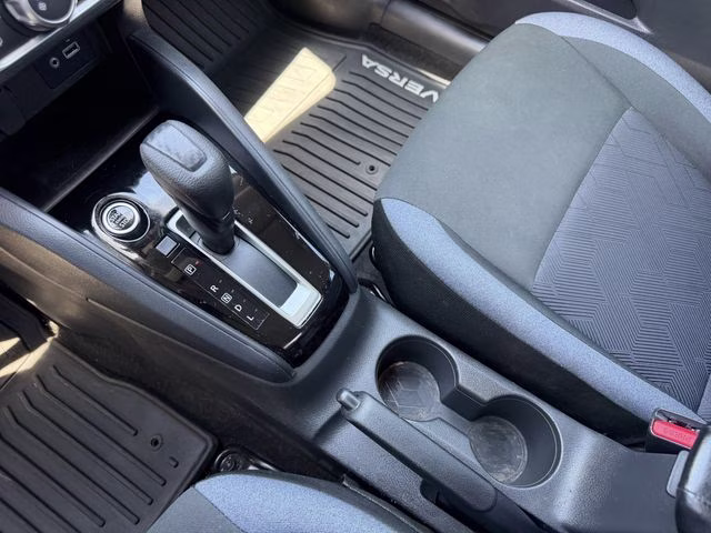 2024 Scarlet Ember Tintcoat Nissan Versa 1.6 SV FWD Sedan