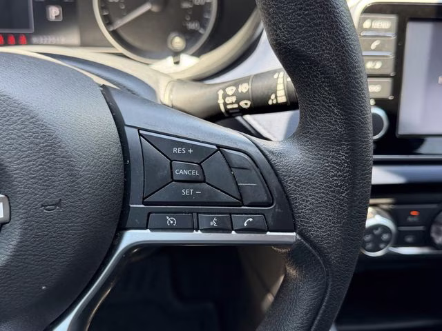 2024 Scarlet Ember Tintcoat Nissan Versa 1.6 SV FWD Sedan