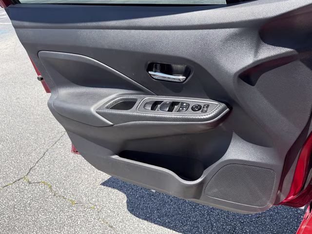 2024 Scarlet Ember Tintcoat Nissan Versa 1.6 SV FWD Sedan