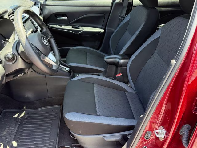 2024 Scarlet Ember Tintcoat Nissan Versa 1.6 SV FWD Sedan