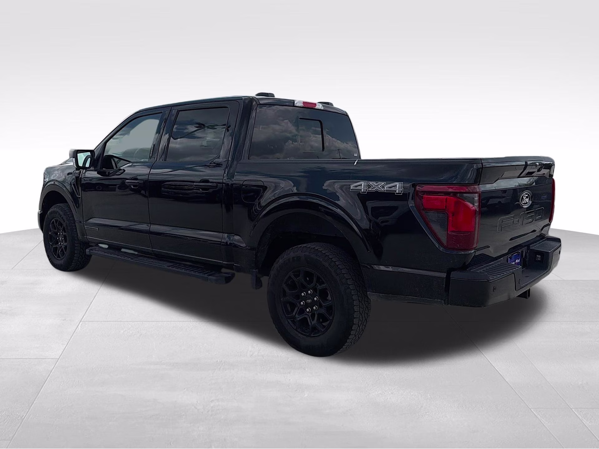 2024 Agate Black Metallic Ford F-150 XLT 4X4 Truck