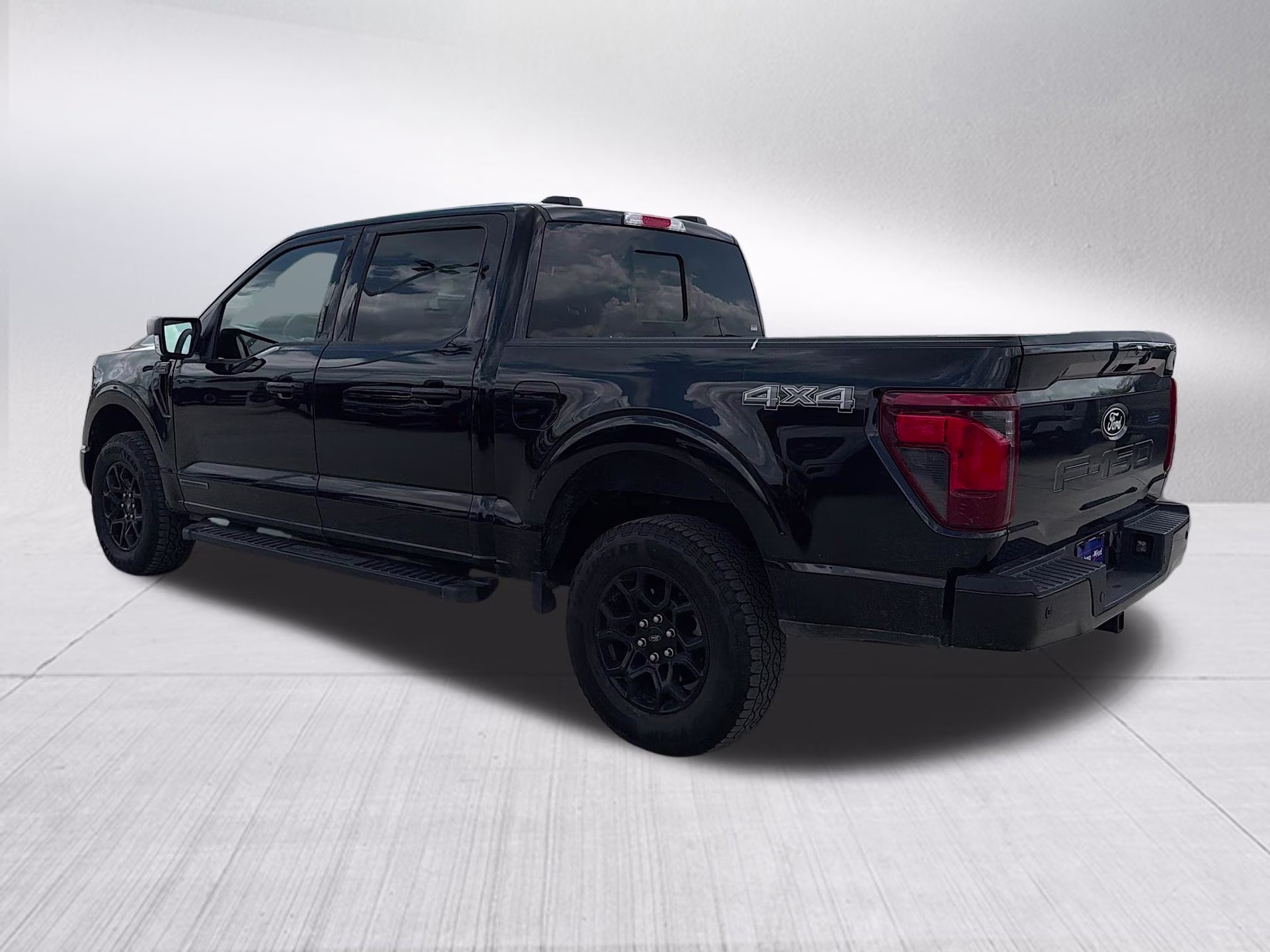 2024 Agate Black Metallic Ford F-150 XLT 4X4 Truck
