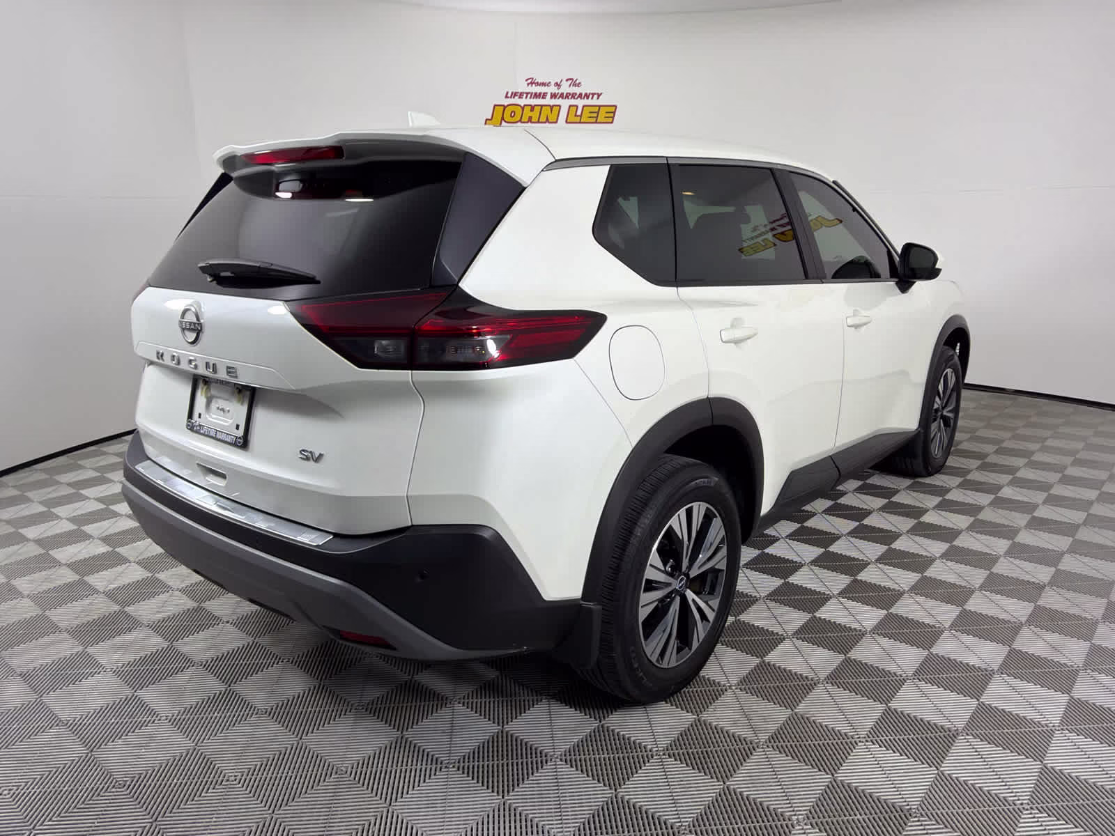 2023 Pearl White Tricoat Nissan Rogue SV FWD SUV