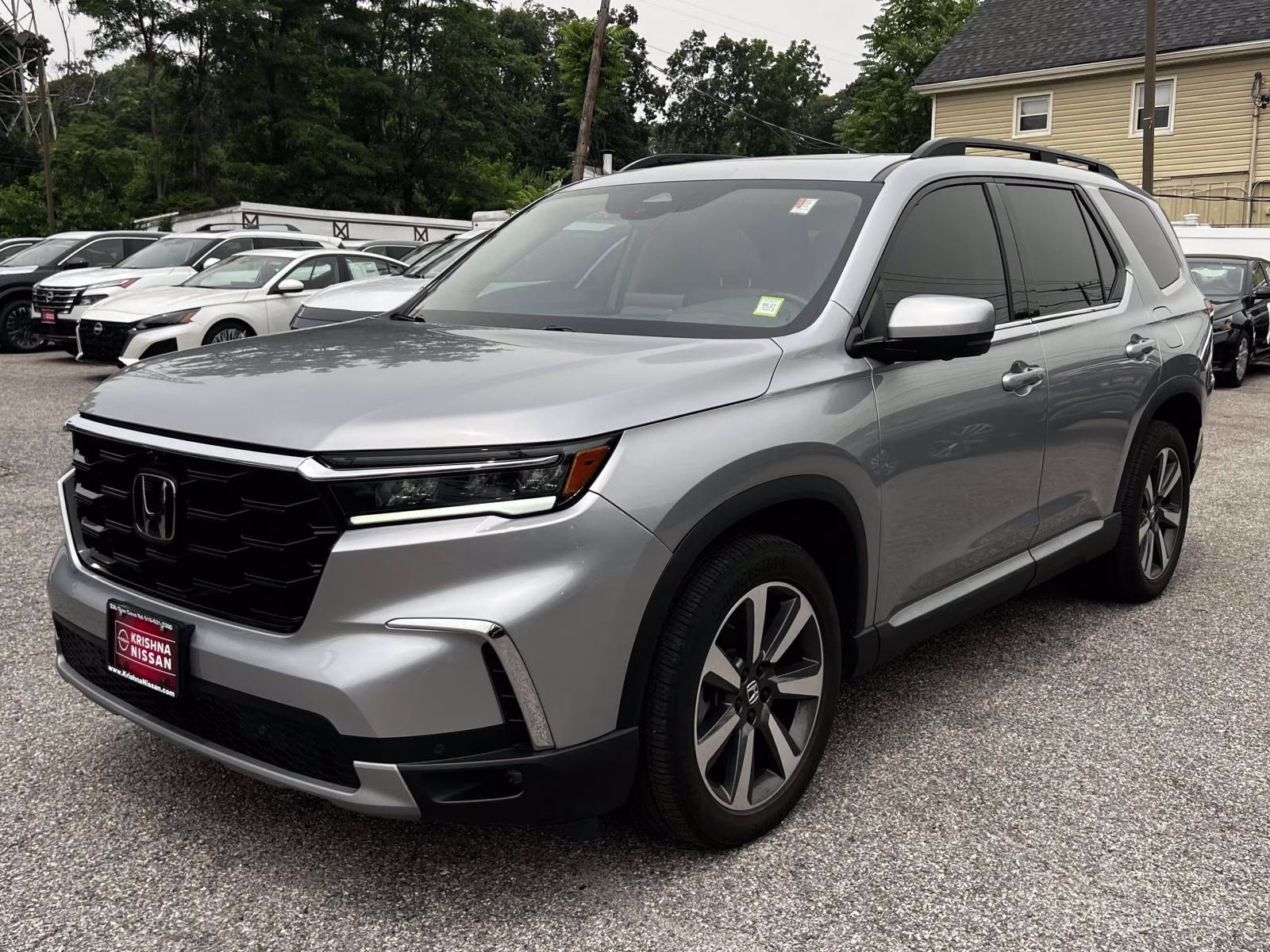 2023 Lunar Silver Metallic Honda Pilot Elite AWD AWD SUV