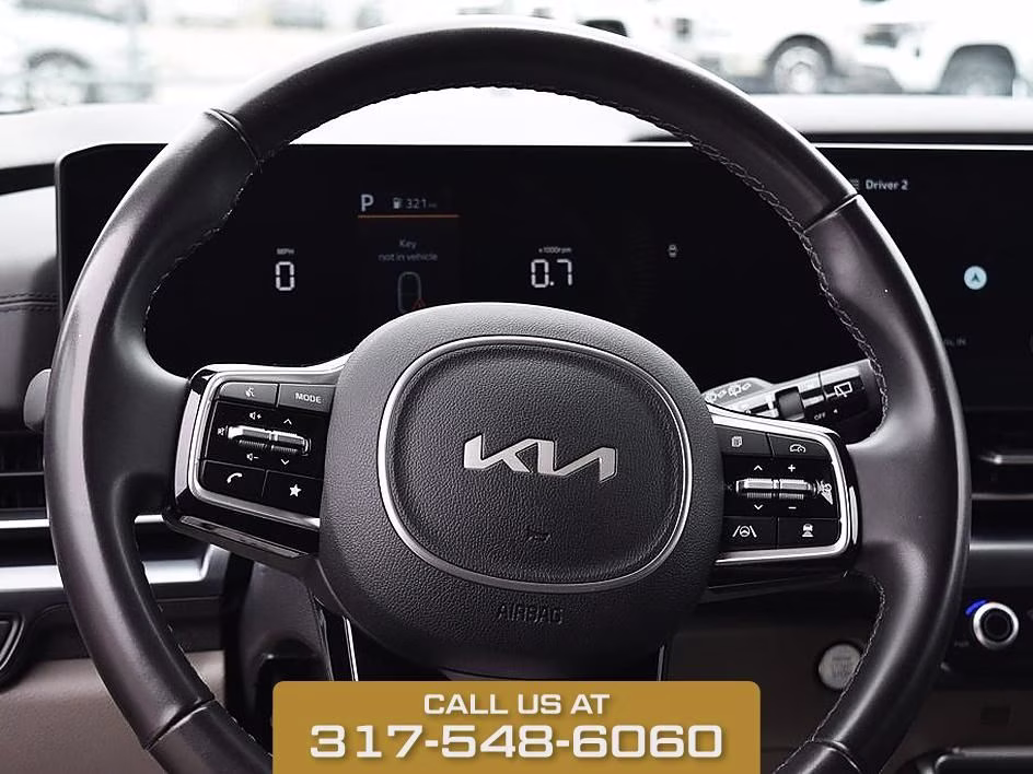 2025 Aurora Black Kia Carnival LXS FWD Van