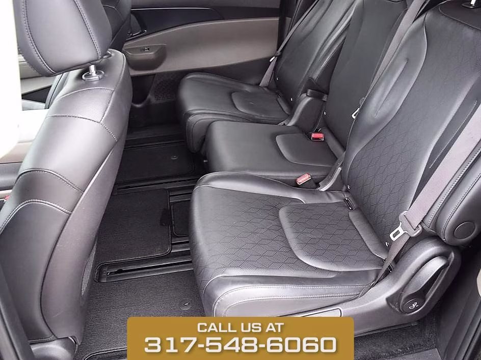 2025 Aurora Black Kia Carnival LXS FWD Van
