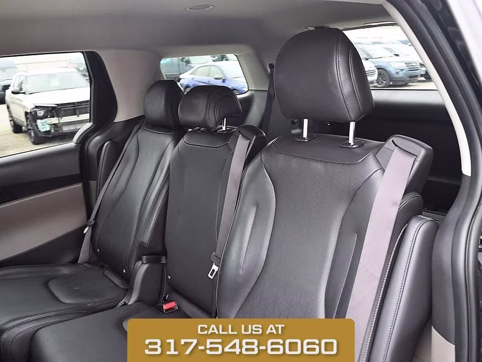 2025 Aurora Black Kia Carnival LXS FWD Van