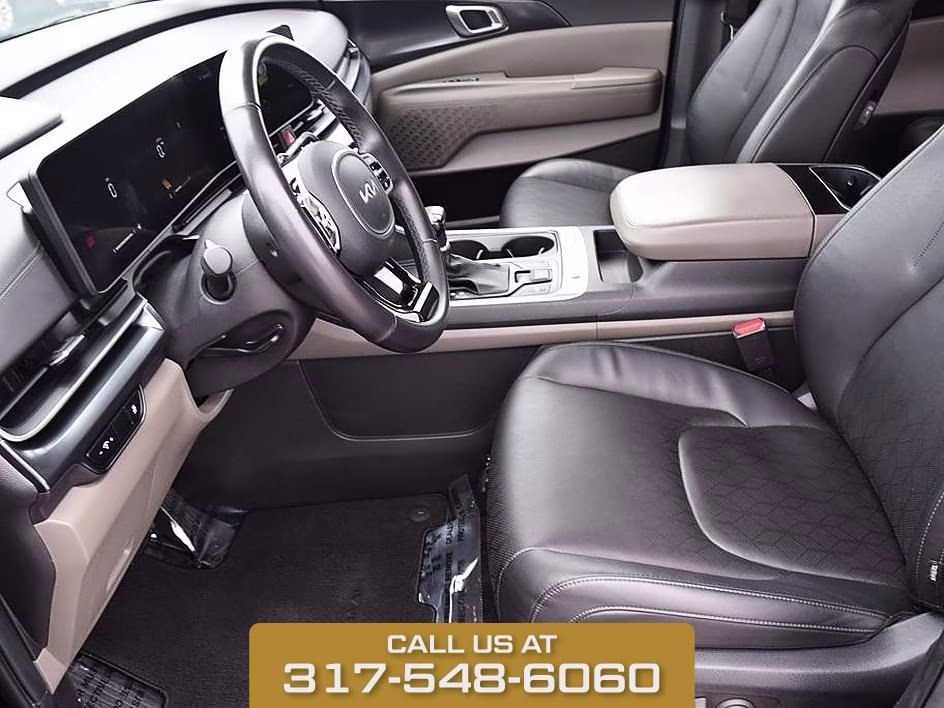 2025 Aurora Black Kia Carnival LXS FWD Van