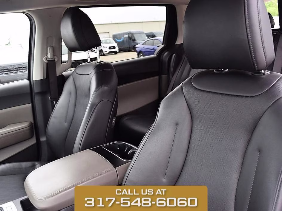 2025 Aurora Black Kia Carnival LXS FWD Van
