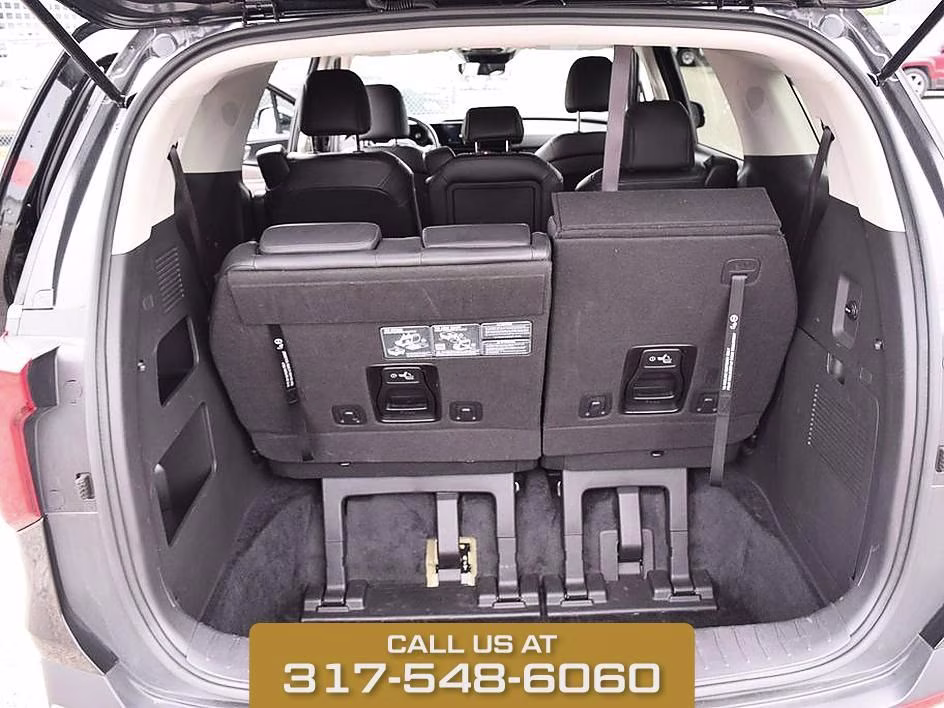 2025 Aurora Black Kia Carnival LXS FWD Van