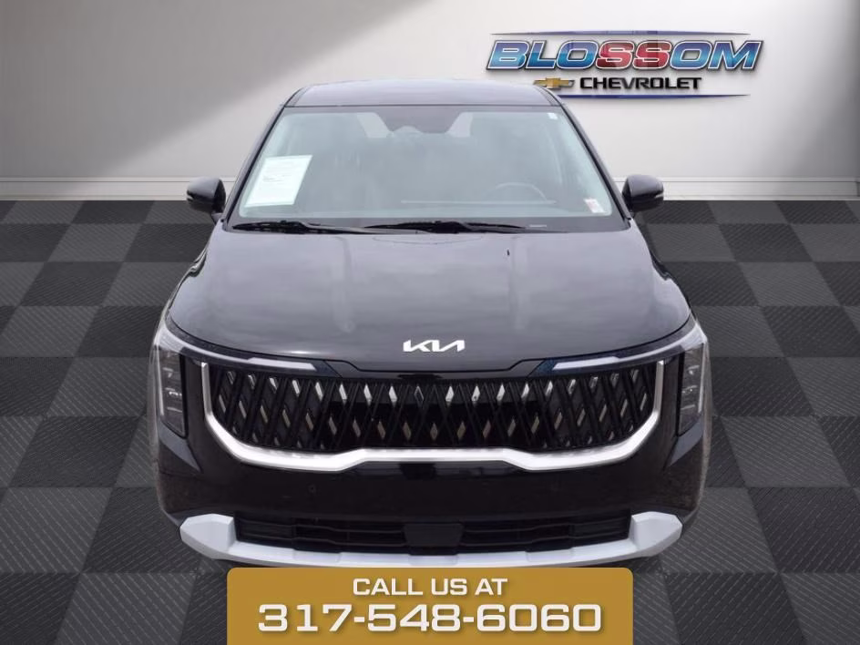 2025 Aurora Black Kia Carnival LXS FWD Van