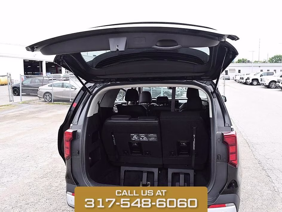 2025 Aurora Black Kia Carnival LXS FWD Van