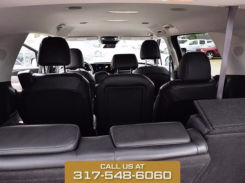 2025 Aurora Black Kia Carnival LXS FWD Van